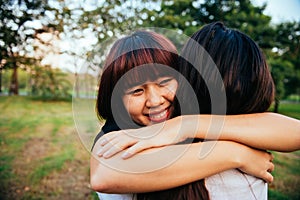 LGBT lesbian women couple moments happiness. Lesbian women couple together outdoors concept.