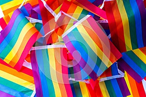 LGBTQ flag and symbol on table top view