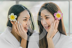 Lgbtq lesbian couple having goodtime relaxing together in spa salon