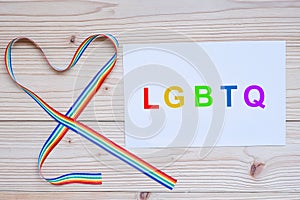 LGBTQ word with heart shape Rainbow ribbon for Lesbian, Gay, Bisexual, Transgender and Queer community