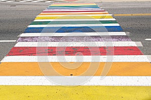 LGBTQI pride pedestrian crosswalk rainbow colors, copy space