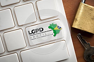 LGPD: a white keyboard with a key with text Lei Geral de ProteÃ§Ã£o de Dados Pessoais. This law regulate data protection and