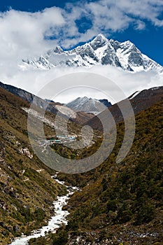 Lhotse and Lhotse shar peaks. Village and stream