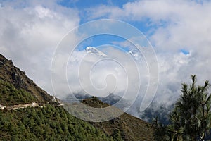 Lhotse Snow Peak is fourth highest mountain in the world with cloud