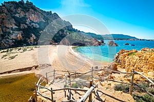 Li Cossi beach in Costa Paradiso under a shining sun