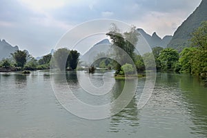 Li river runs through the fairy karst landscape of Yangshuo in Guangxi Zhuang Autonomous Region in China.