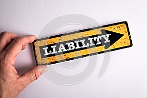 Liability Concept. Direction arrow with text on white background