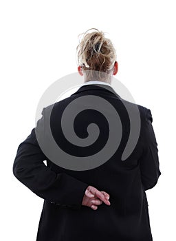 Liar businesswoman with crossed fingers at back photo