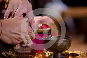 Libation, Thai engagement, pour water in Thai wedding, pouring water in Thai wedding