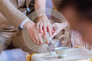 Libation, Thai engagement, pour water in Thai wedding, pouring water in Thai wedding.