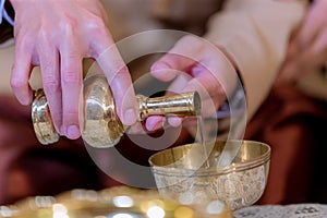 Libation, Thai engagement, pour water in Thai wedding, pouring water in Thai wedding