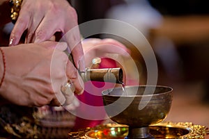 Libation, Thai engagement, pour water in Thai wedding, pouring water in Thai wedding photo