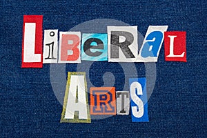 LIBERAL ARTS text word collage, colorful fabric on blue denim, humanities education