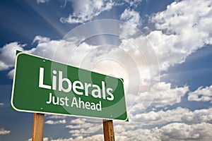 Liberals Green Road Sign and Clouds