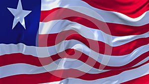 Liberia flag waving in wind continuous seamless loop background.