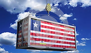 Liberia - freight shipping container with national flag on crane hook