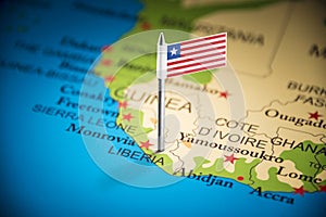 Liberia marked with a flag on the map