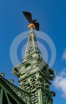 Liberty Bridge in Budapest decorated with an bronze statue of the mythological bird Turul