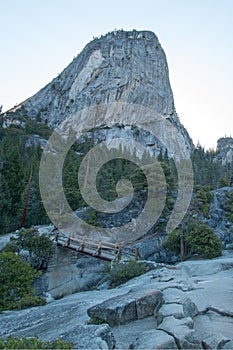 Liberty Cap mountain peak and Nevada Falls seen from the Mist Hiking Trail in Yosemite National Park in California USA