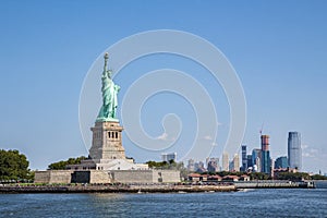 Liberty island with Manhattan as bakground photo