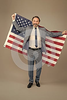 Liberty and justice for all. Patriotic businessman hold american flag. Happy man celebrate Independence day. American