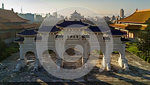 `Liberty Square` text on the archway, Aerial view Chiang Kai Shek Memorial Hall and Taipei city skyline and skyscraper background,