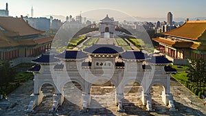 `Liberty Square` text on the archway, Aerial view Chiang Kai Shek Memorial Hall and Taipei city skyline and skyscraper background,