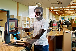 Librarian checking out books