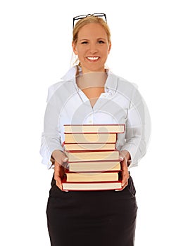 Librarian holding pile of books