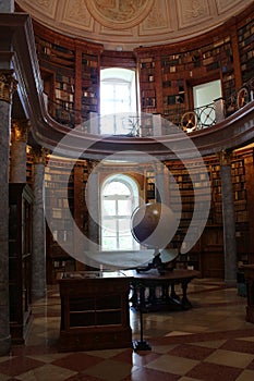 Library in The Benedictine Pannonhalma Archabbey with globe photo