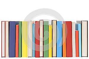 Library books in a row, isolated white background