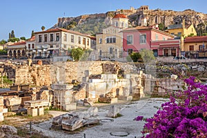 Library of Hadrian overlooking vintage houses and Acropolis, Athens, Greece