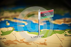 Libya marked with a flag on the map photo