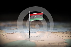 Libya marked with a flag on the map