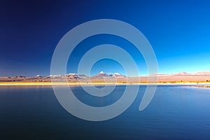 Licancabur volcano and Cejar salt lake in Atacama, wide angle