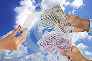 License or invention patents purchase concept, with light bulb and different cash banknotes on clear blue sky