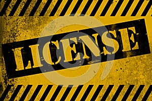 License sign yellow with stripes