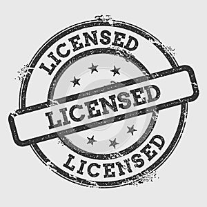 Licensed rubber stamp isolated on white.