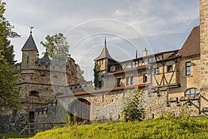 Lichtenstein Castle with auxiliary building, wall and a Tower