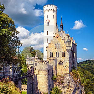 Lichtenstein Castle in summer, Baden-Wurttemberg, Germany. This famous castle is a landmark of Germany. Scenic view of fairytale photo