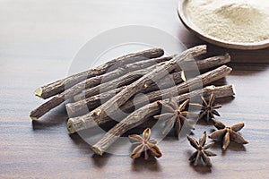 licorice root and anise on the table - Glycyrrhiza glabra photo