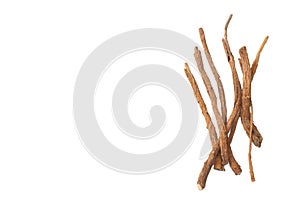 Licorice roots isolated on white background. top view