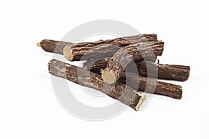 Licorice roots in a pile sticks macro closeup