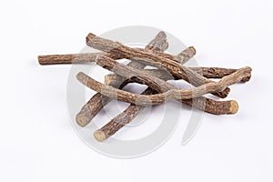 Licorice roots in a pile sticks macro closeup