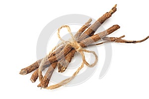 licorice roots on white background