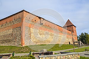 Lida castle old fortress orange color, located in the city of Lida, Belarus