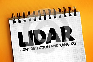 LiDAR - light detection and ranging acronym text on notepad, abbreviation concept background