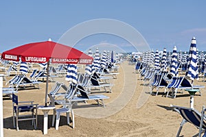 LIDO DI JESOLO, ITALY: Umbrellas on the beach of Lido di Jesolo at adriatic Sea in a beautiful summer day, Italy. On the beach of