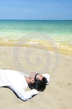 Lie down on tropical beach
