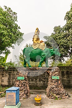 Lie Lu-Oew Koong, god on green bull at Wang Saen Suk monastery, Bang Saen, Thailand